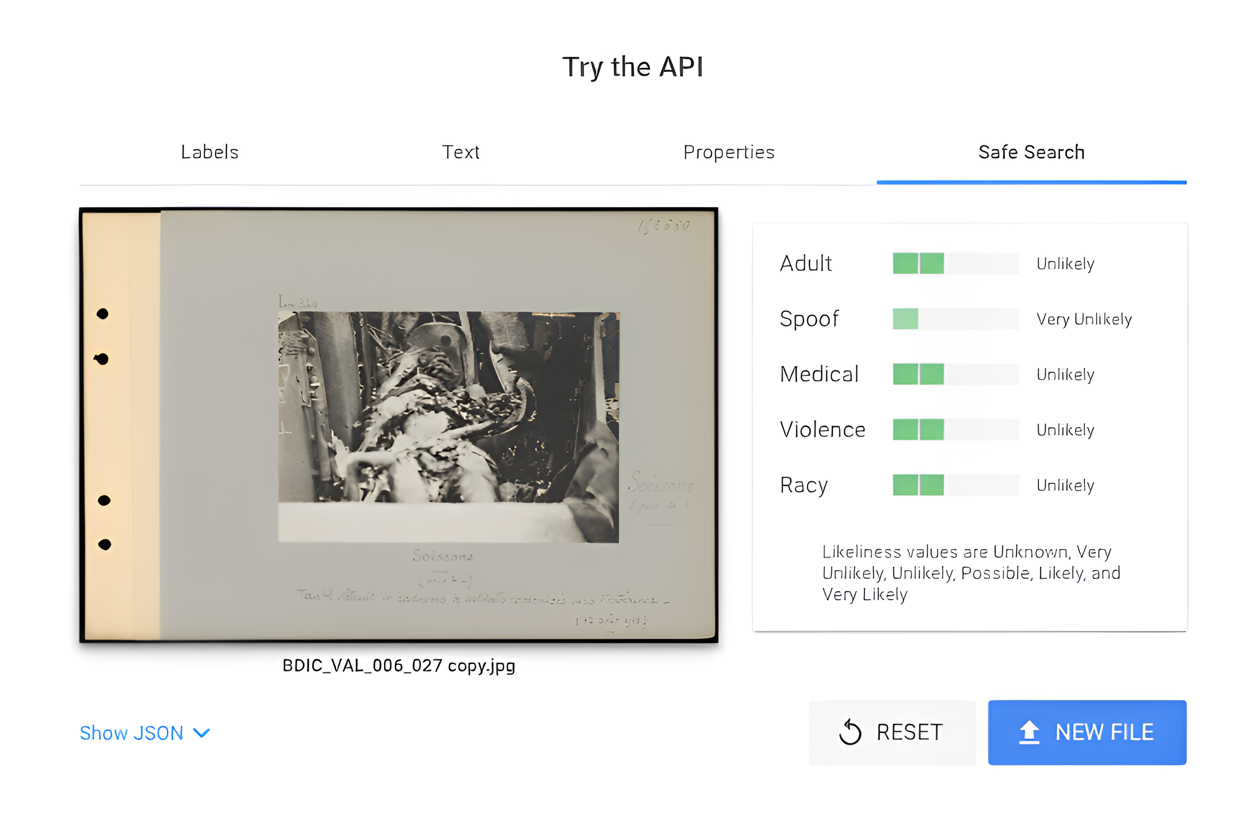 Google Vision API test showing Unlikely result for automatic detection of violence in a photograph of dead German soldiers inside a destroyed tank during World War I.